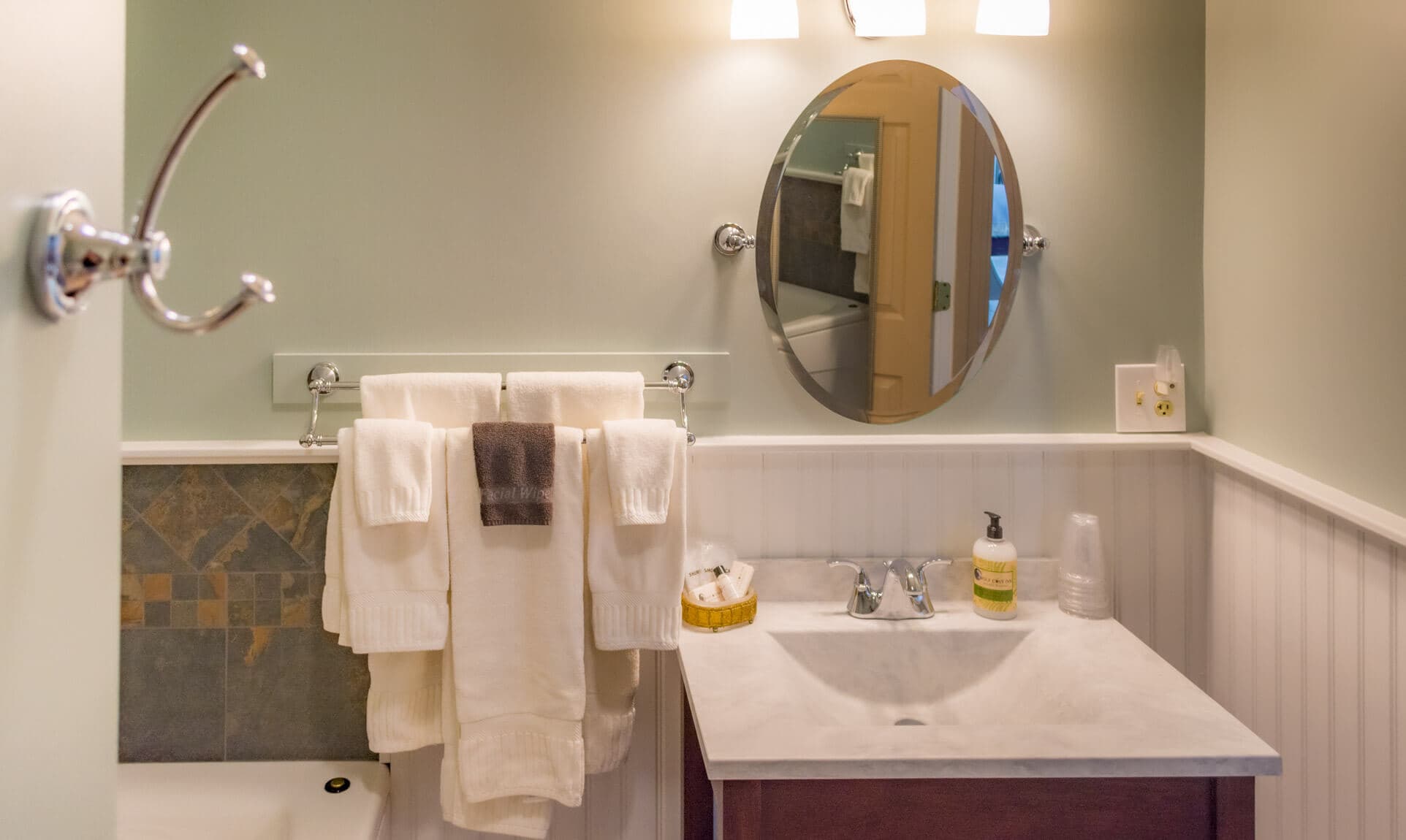 Bathroom sink and spa tub.