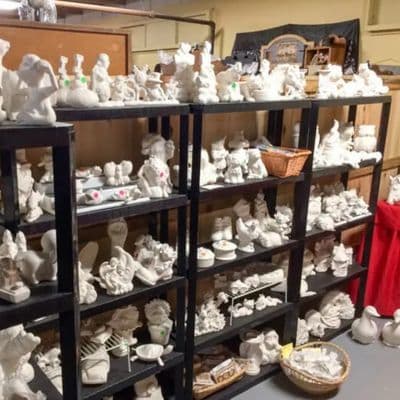 figurine display at the willow flea market in maine