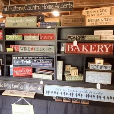 distressed sign display at the willow flea market in maine