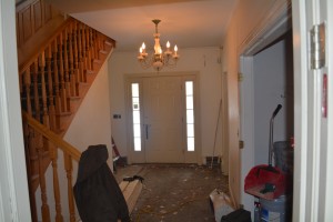 Still lots of work to do in the main entry foyer!  Soon enough we'll see the new floor, freshly painted walls and a cool new light fixture (shhh, don't tell anyone - it's a secret!)
