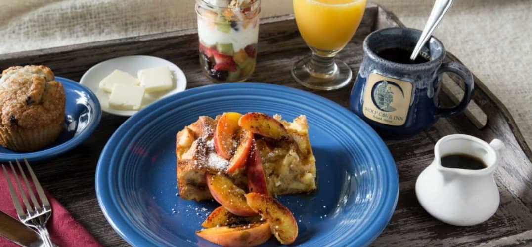 breakfast tray with coffee, juice and French toast