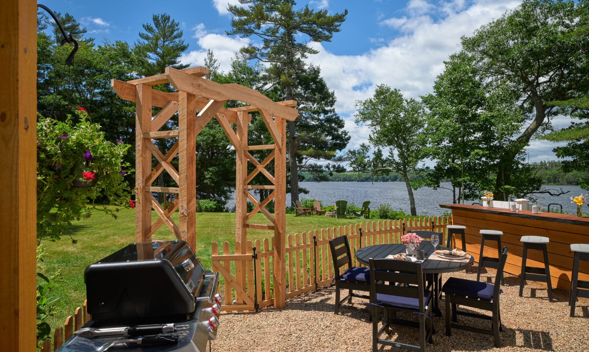 Private garden with gas grill, dining table, and bar top