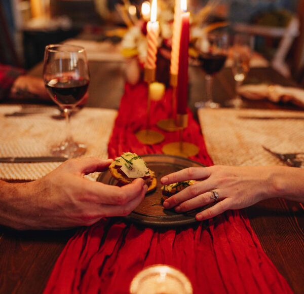 A couple sharing a snack in the romance dinner