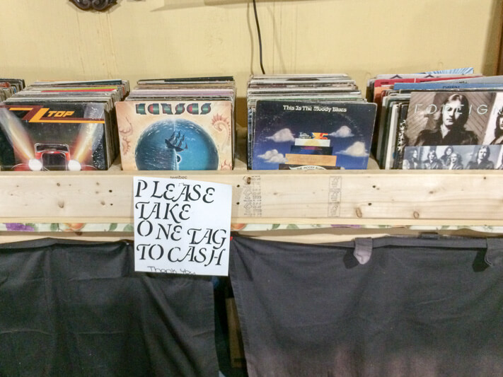 Hundreds LPs on display stand In Stock At The Willows